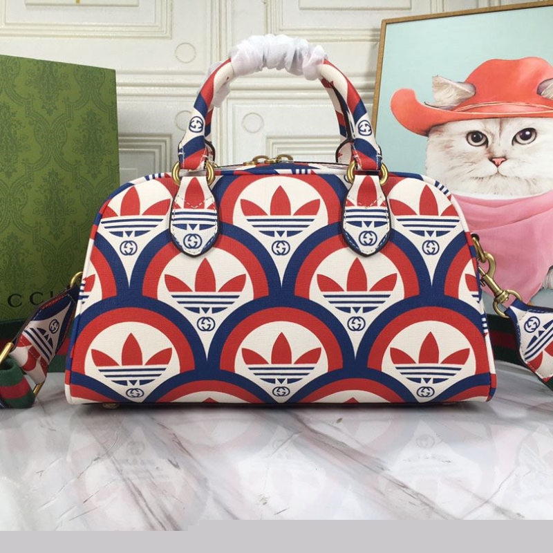 G*u*i top handle bags